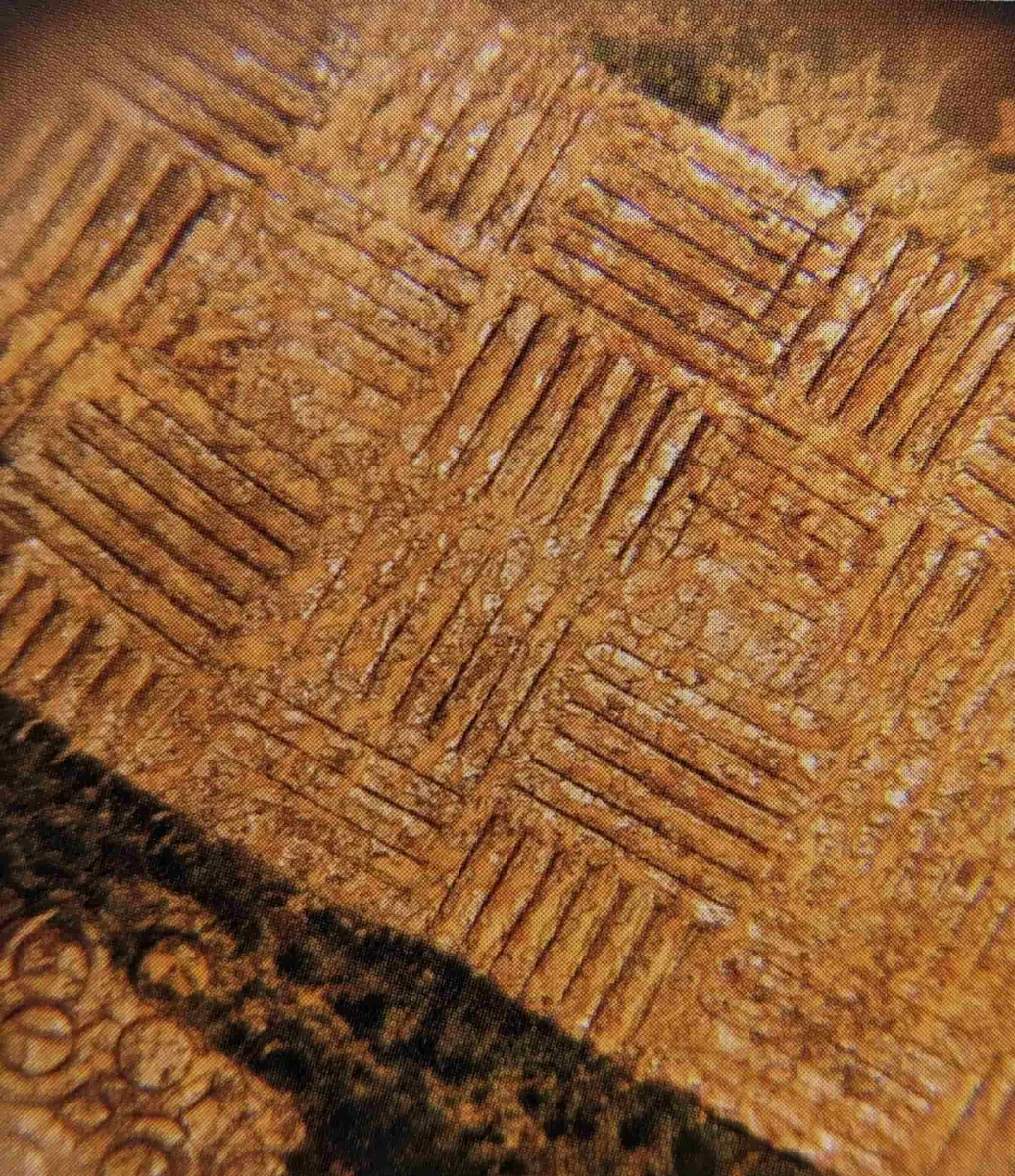 Small hammered ornaments on gilt leather